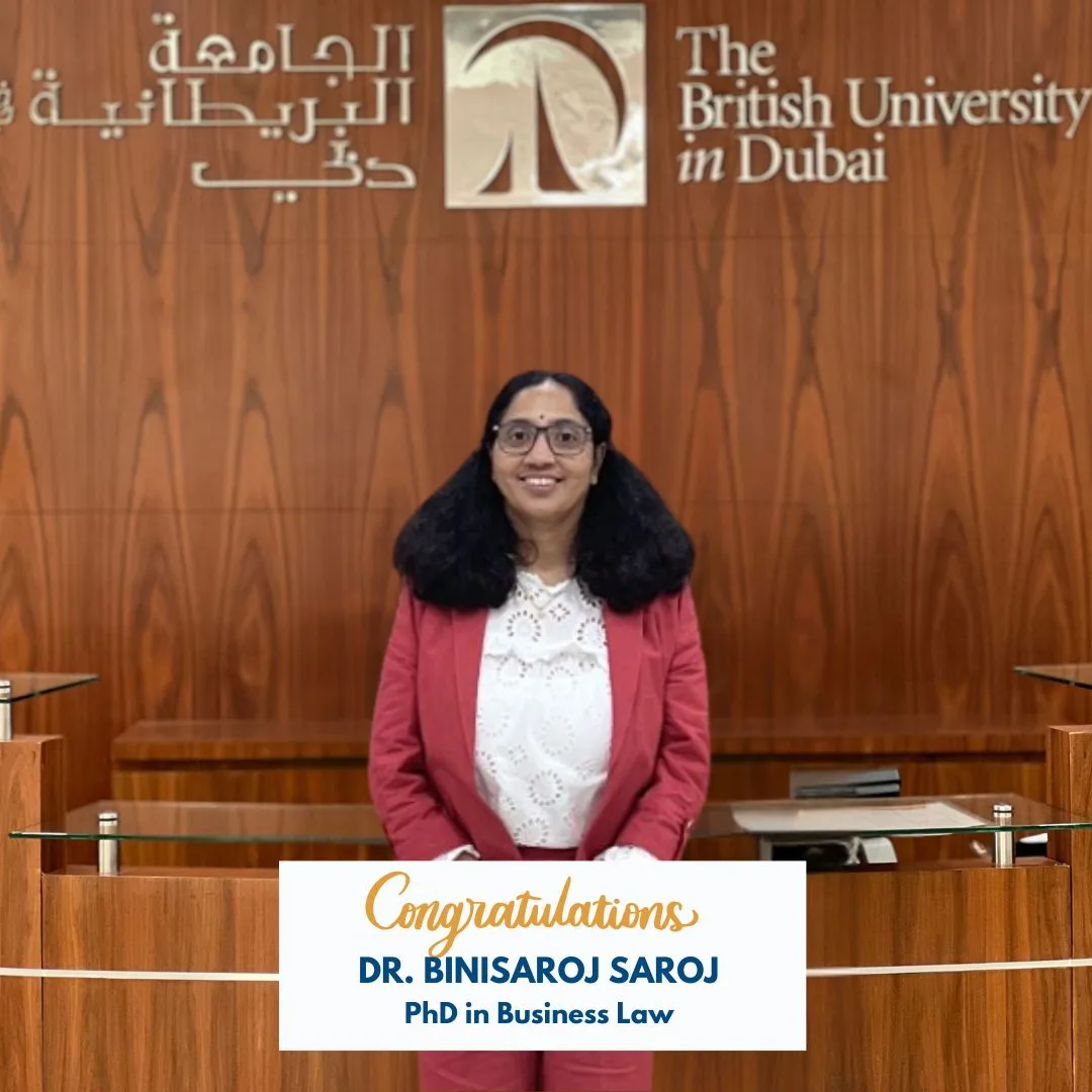 Dr. Bini Saroj receiving her PhD in Business Law at the British University in Dubai.